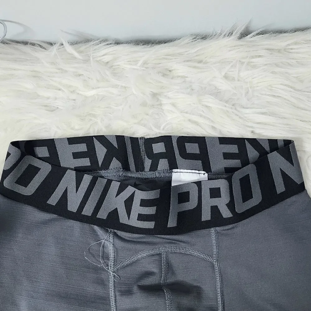 Nike Pro compression pants spell out size medium gray and black